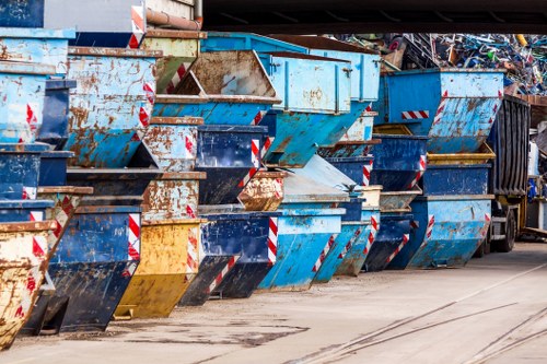 Staff overseeing commercial waste collection at depot entrance